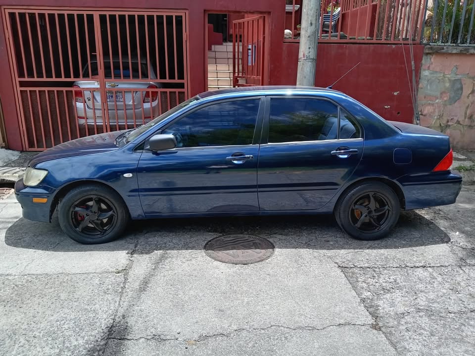 2002 Mitsubishi Lancer - foto 2