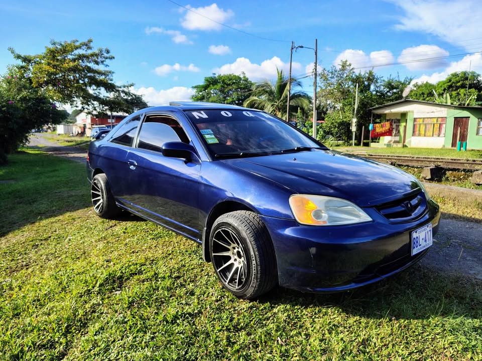 2003 Honda e - foto 3