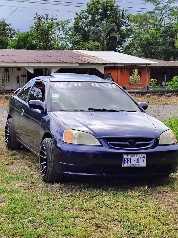 2003 Honda e - foto 4