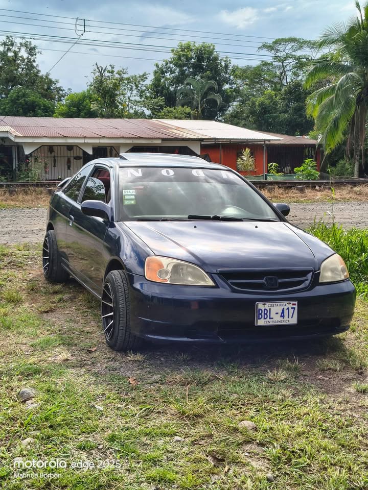 2003 Honda e - foto 5