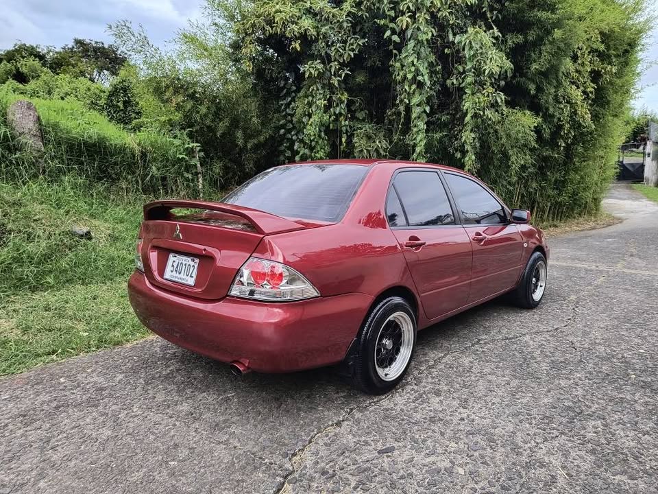 2004 Mitsubishi Lancer - foto 5