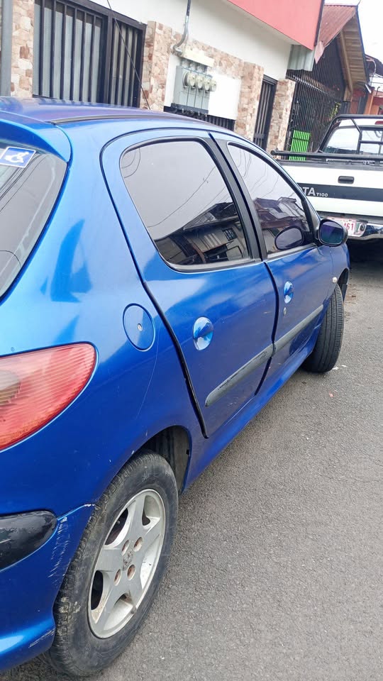 2000 Peugeot 206 - foto 2